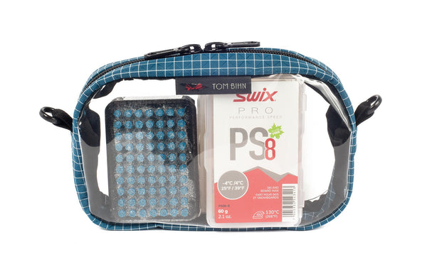 A Fjord (dark blue) with white grid pattern (Halcyon) 3D Clear Organizer Cube filled with sundries.